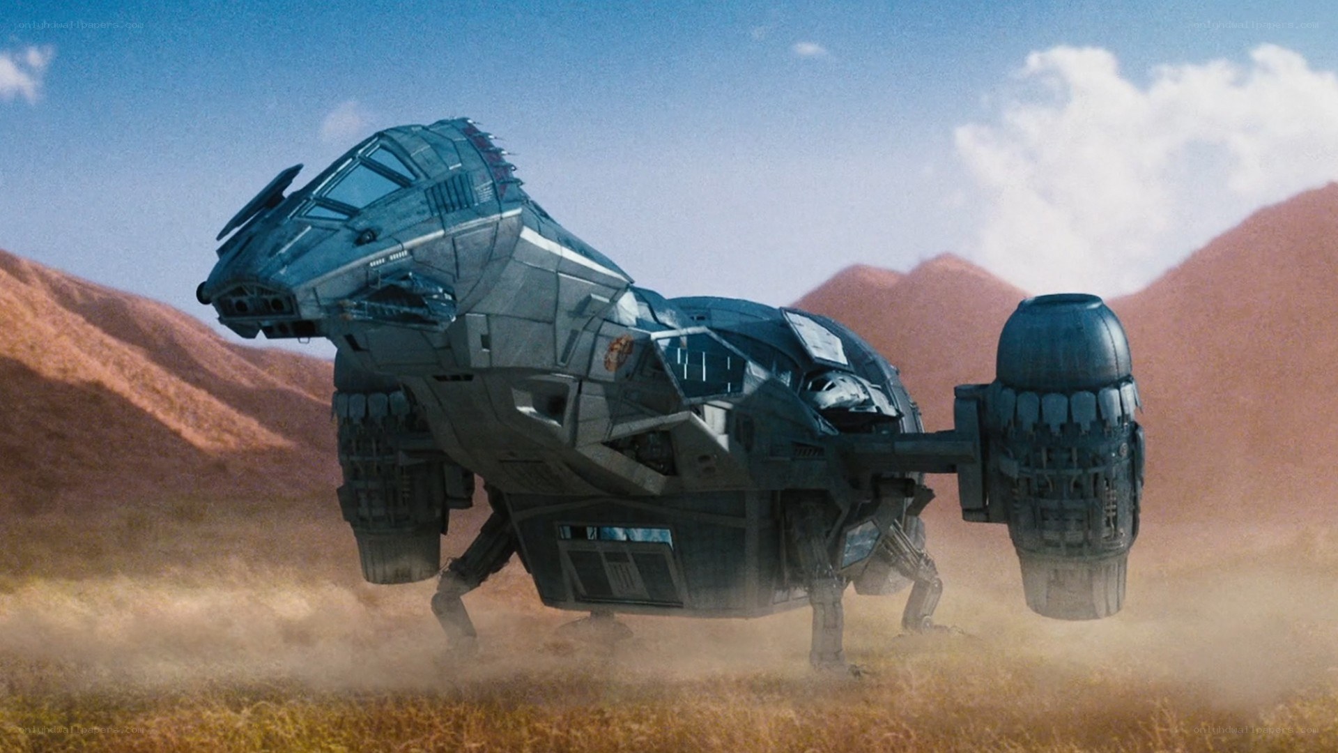 futuristic vehicle in desert