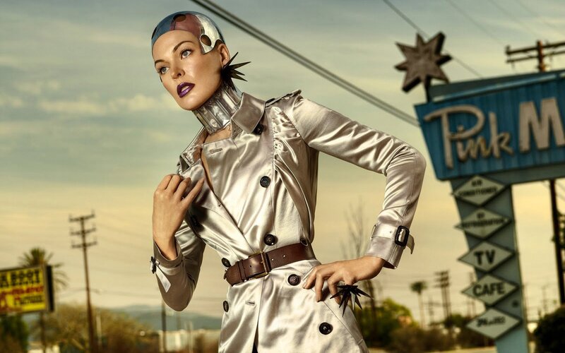 futuristic woman in silver trench coat