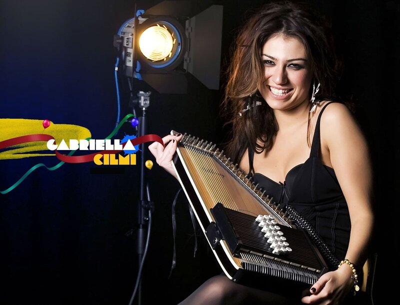 Gabriella Cilmi with a musical instrument
