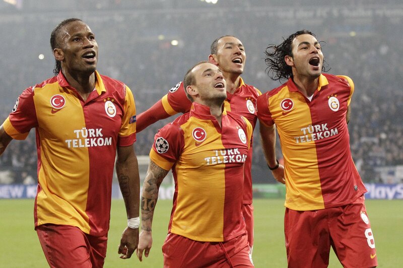 Galatasaray players celebrate on field