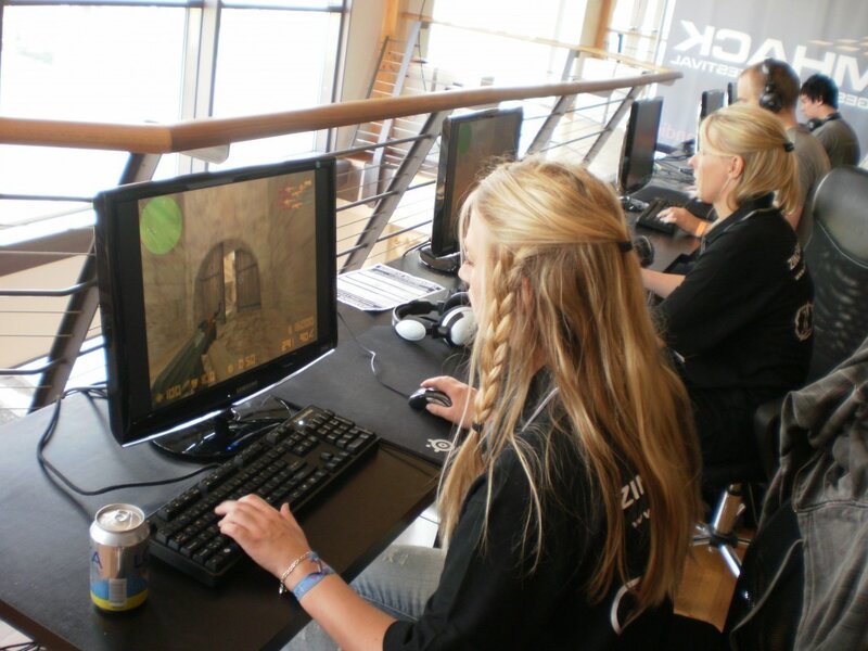 Gamers playing on computers
