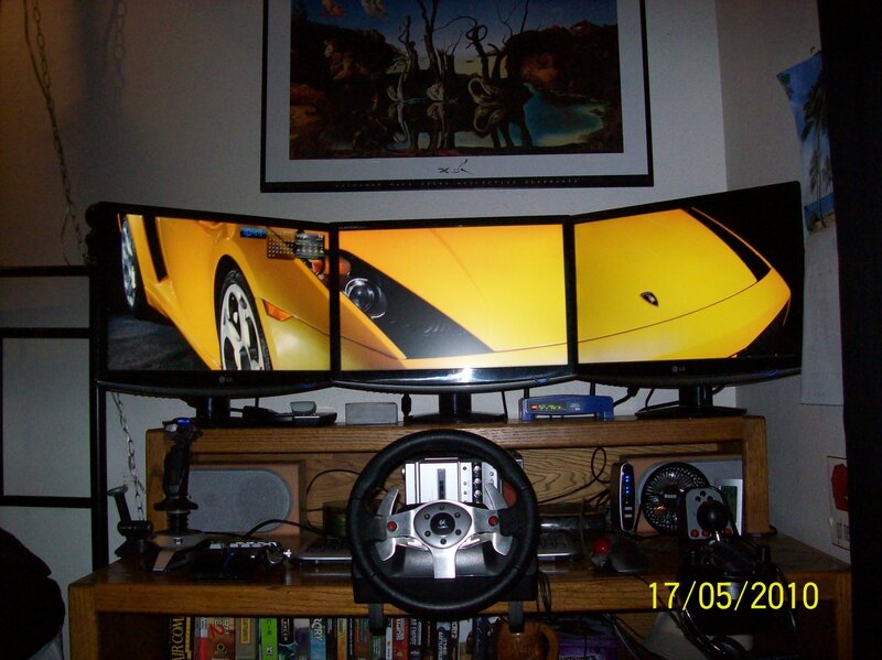 gaming setup with triple monitors