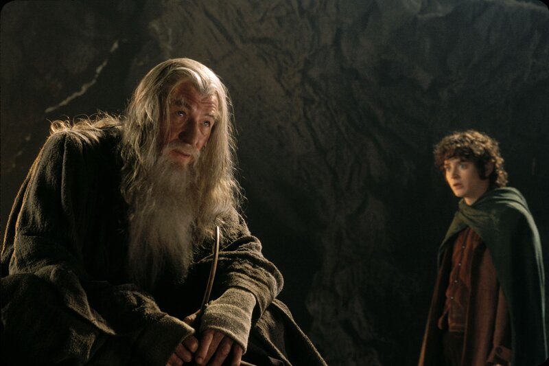Gandalf and Frodo in a cave
