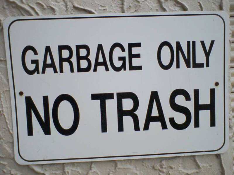 Garbage Sign on Wall