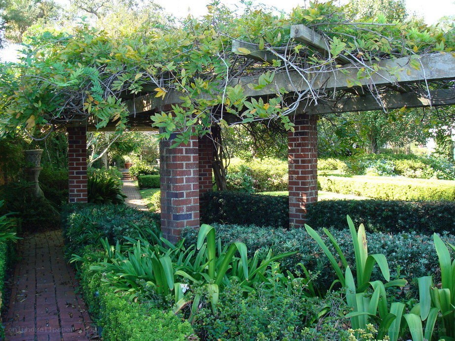 Garden arbor with brick pillars