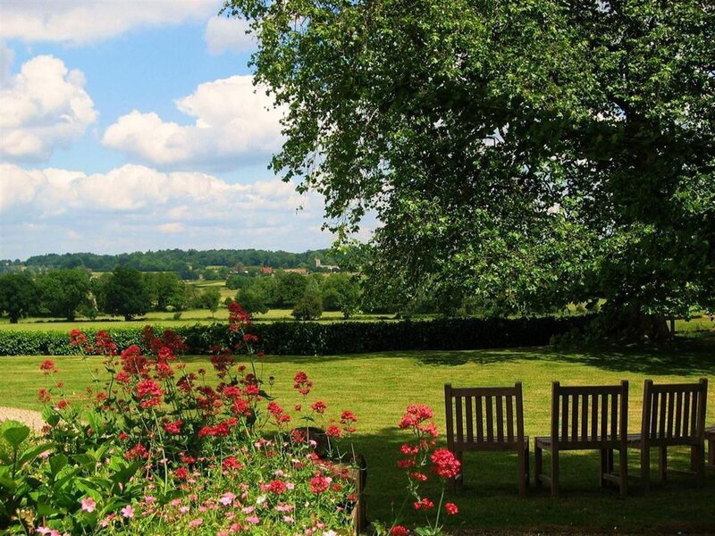 Garden chairs with countryside view