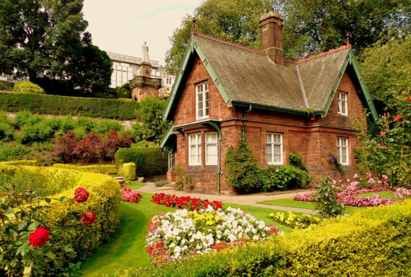 Garden cottage with flower beds