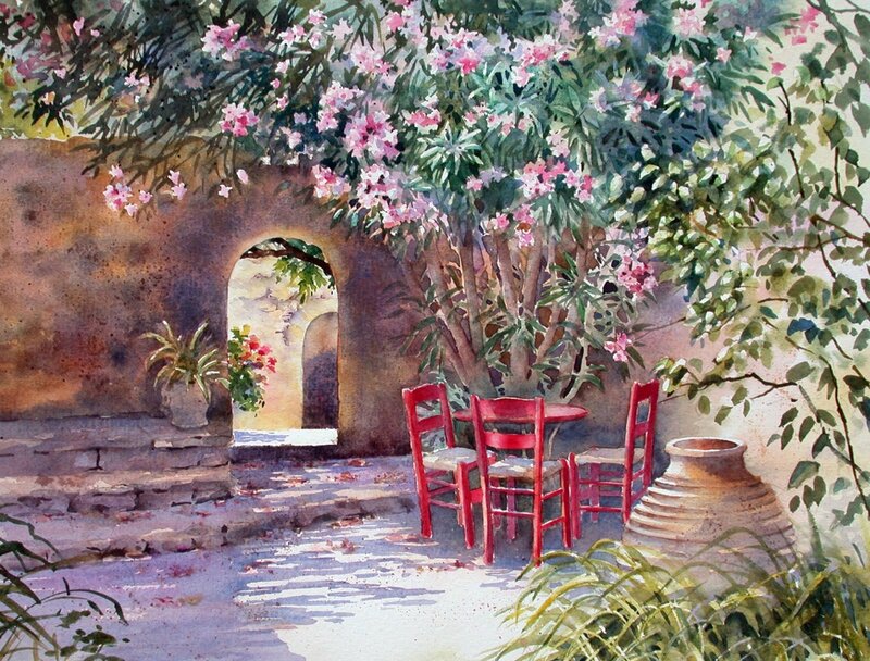 Garden courtyard with red chairs