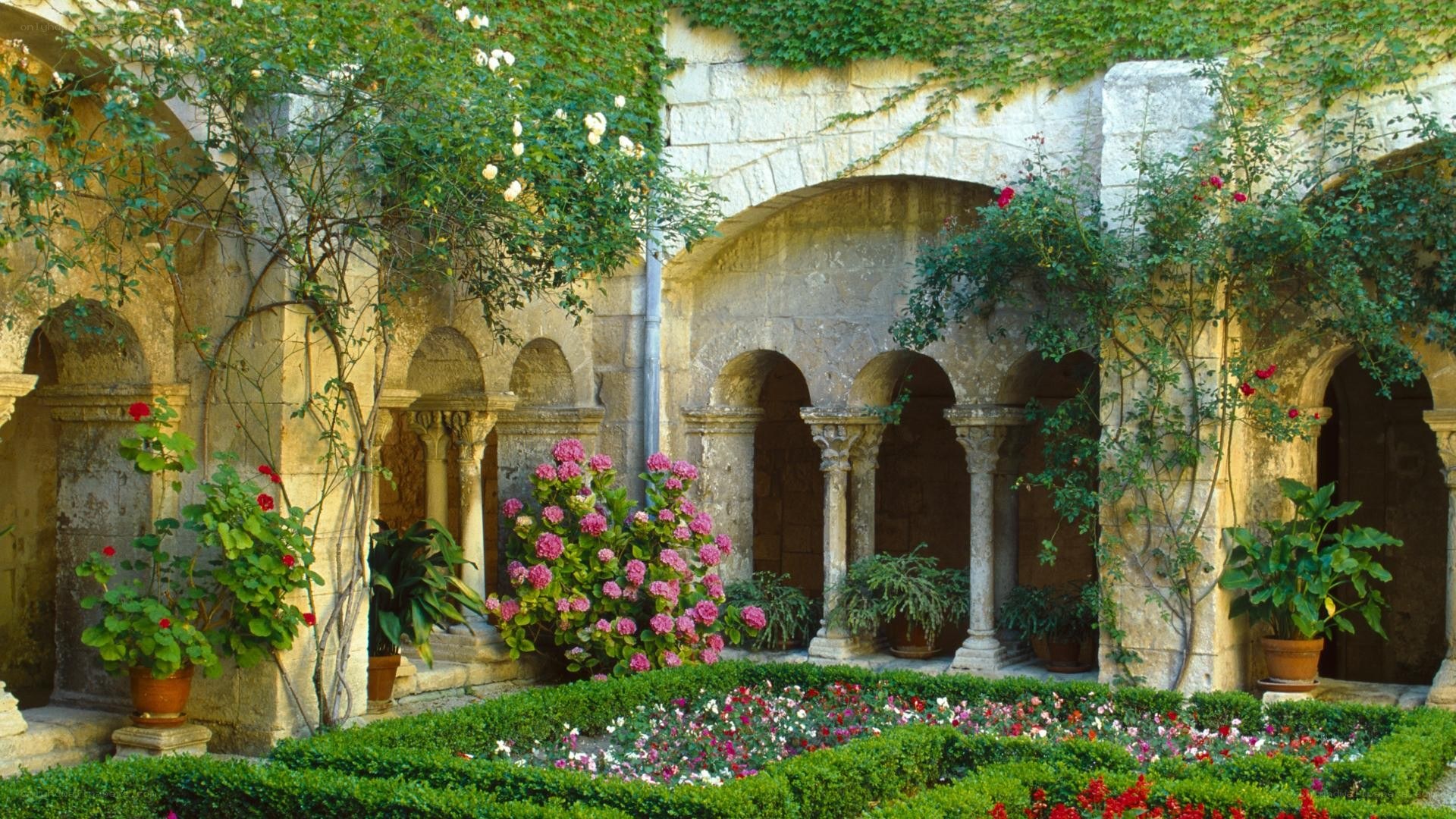 Garden courtyard with stone arches