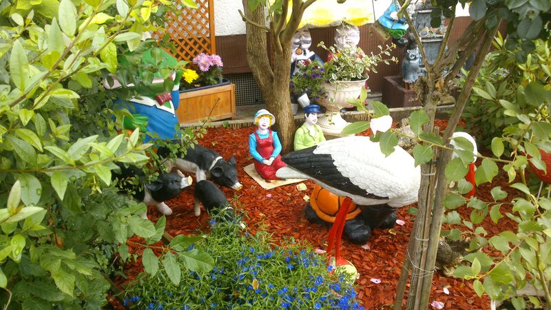 Garden Figurines in Mulch