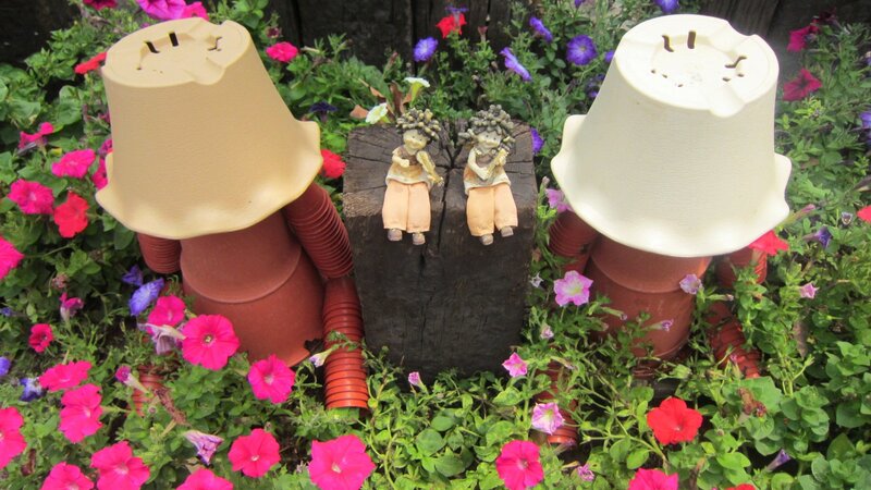 Garden Figurines on Log