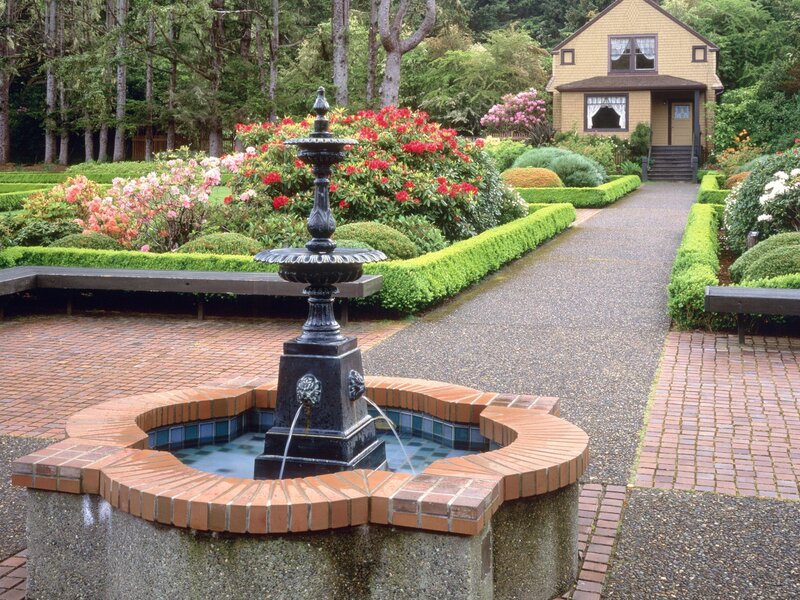 Garden fountain and house