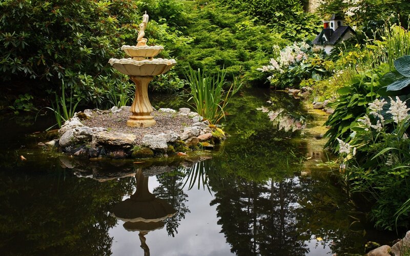 Garden fountain in pond