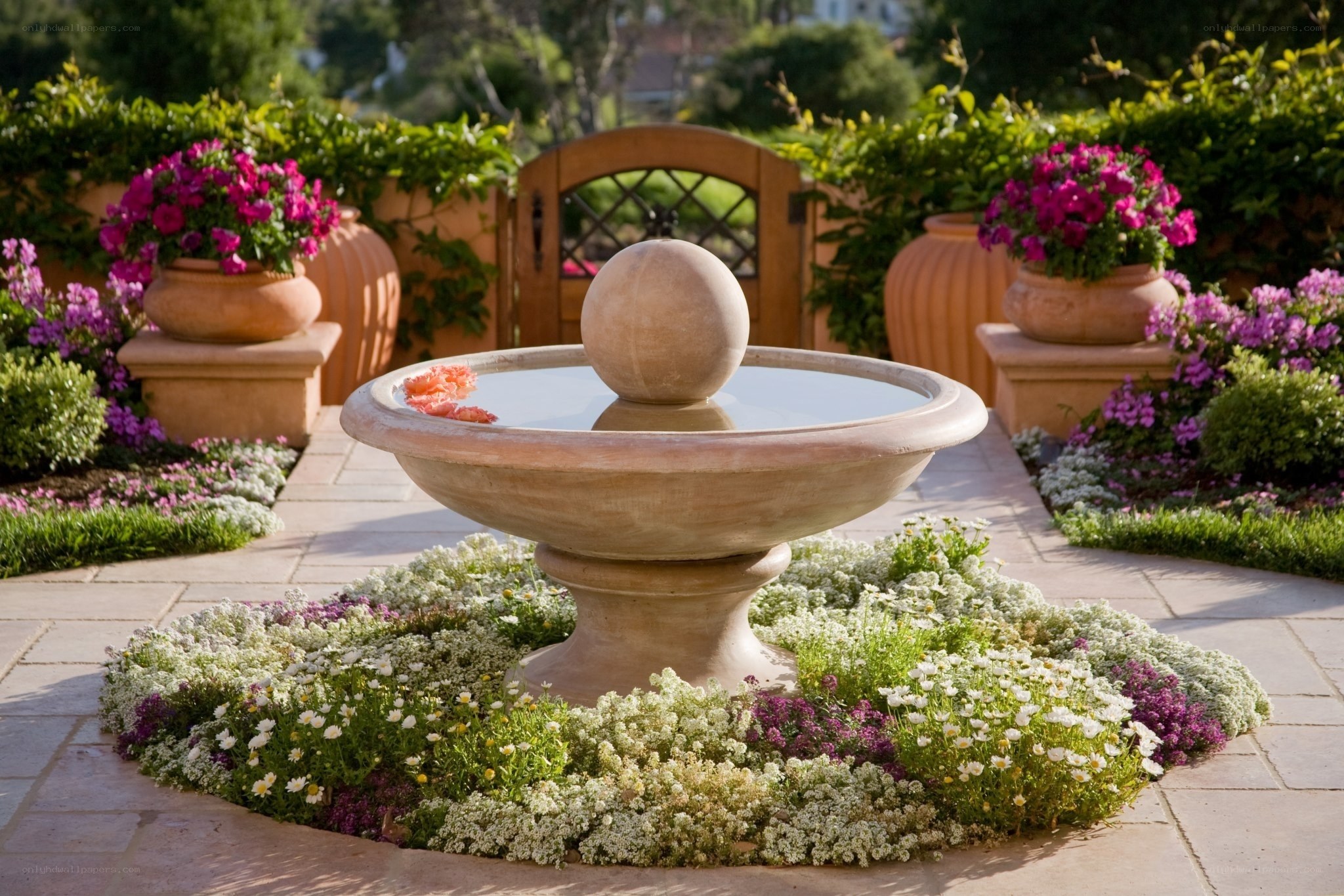 Garden fountain with flowers