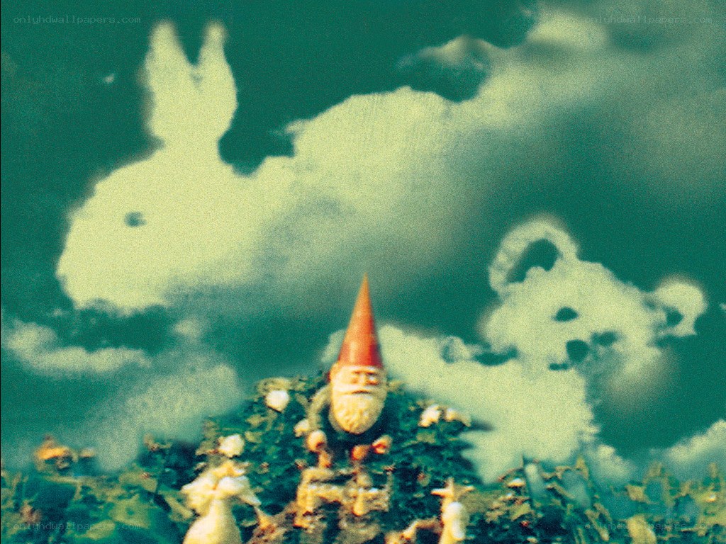 Garden gnome under bunny clouds