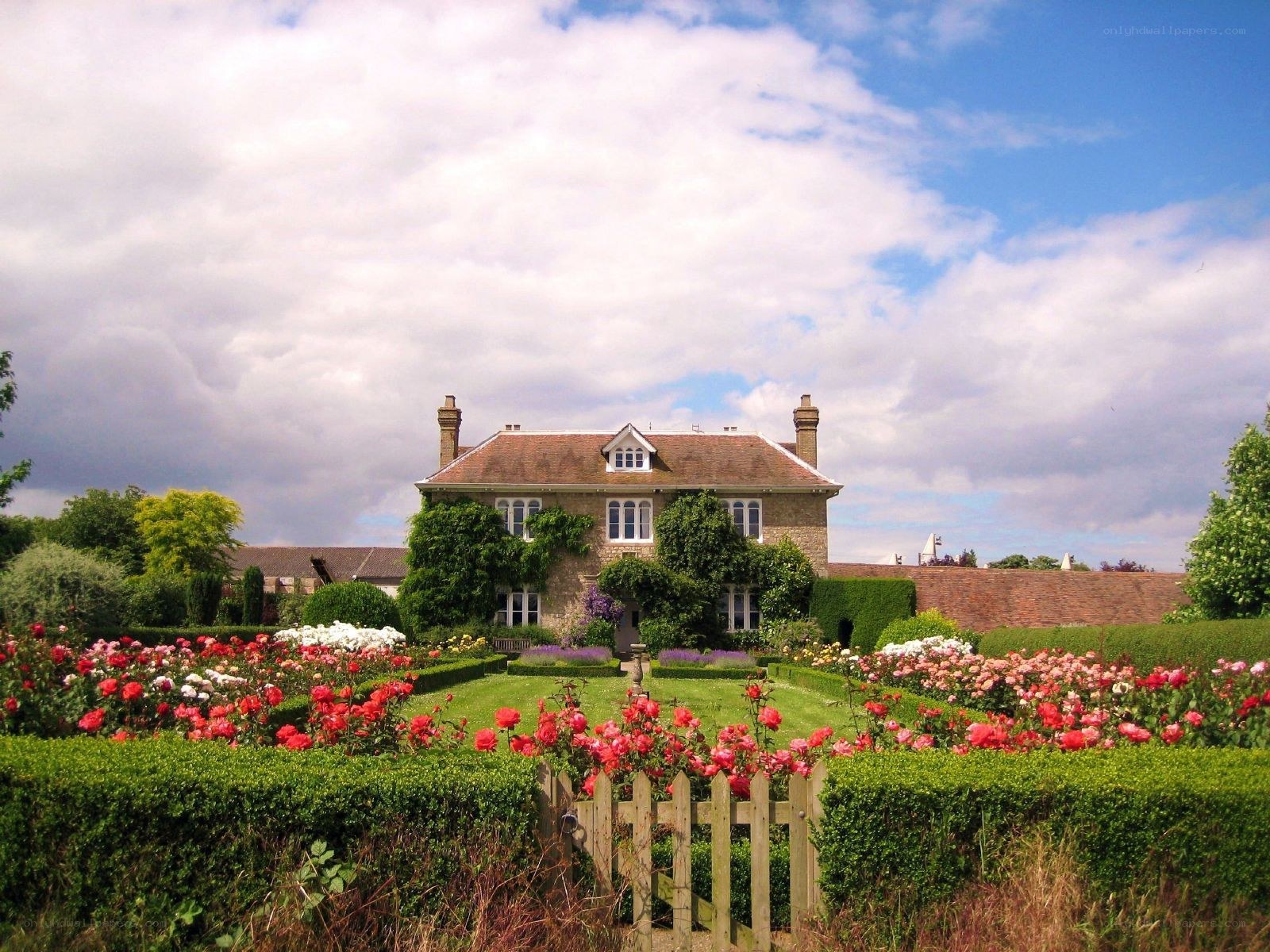 Garden house with roses