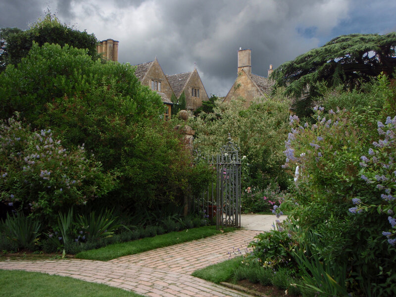 Garden path to stone house