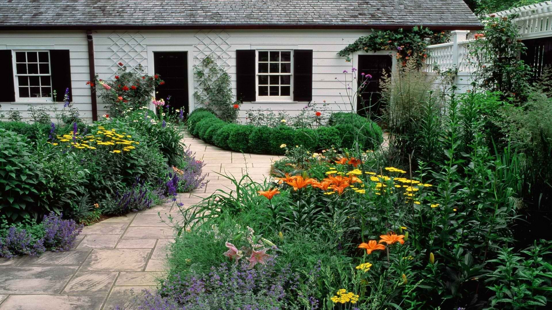 garden path to white cottage