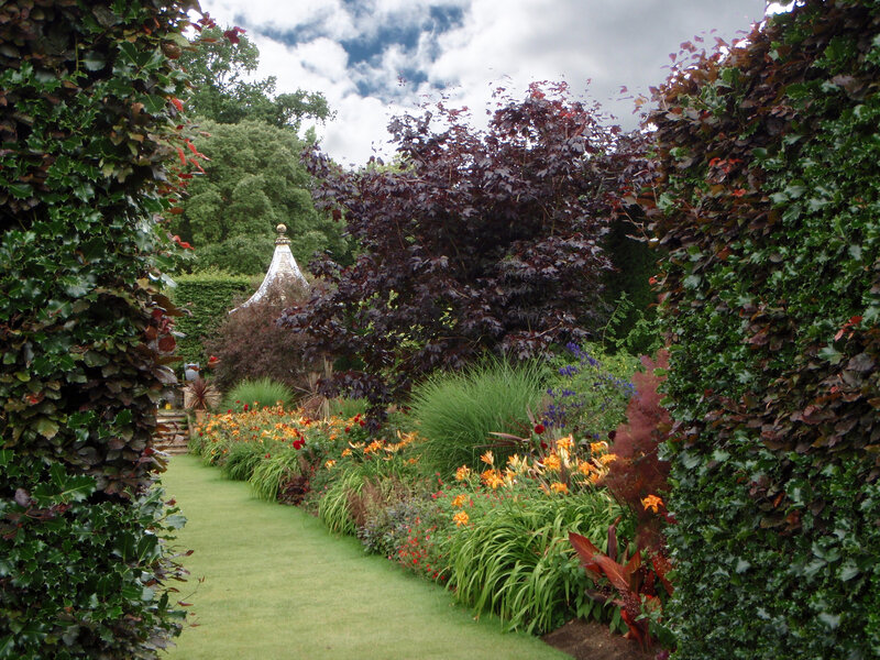 Garden path with flowers and gazebo