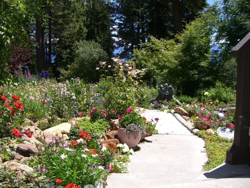 Garden Path with Flowers — Green, Serene, Afternoon, Photograph, Statue