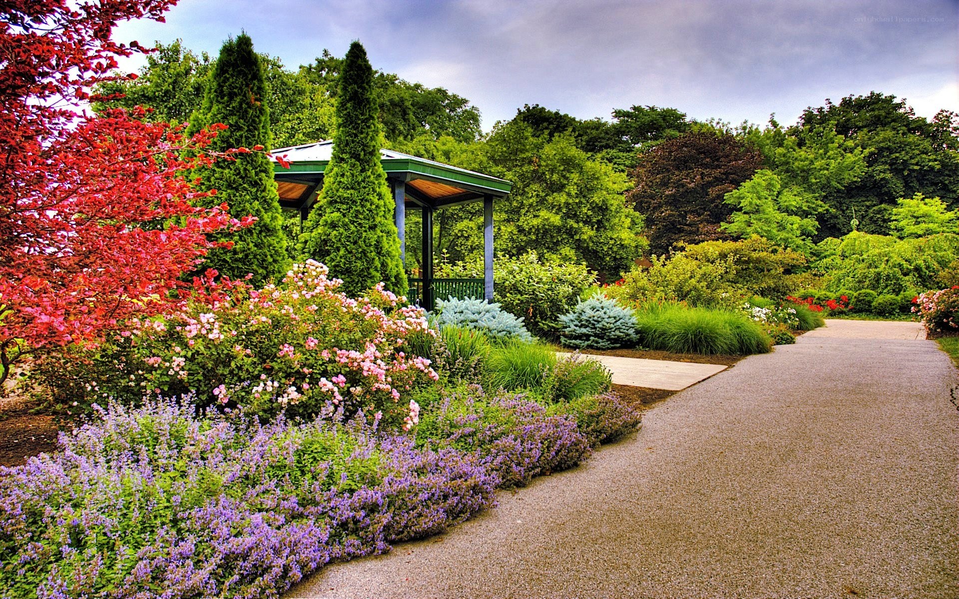 Garden path with gazebo and flowers