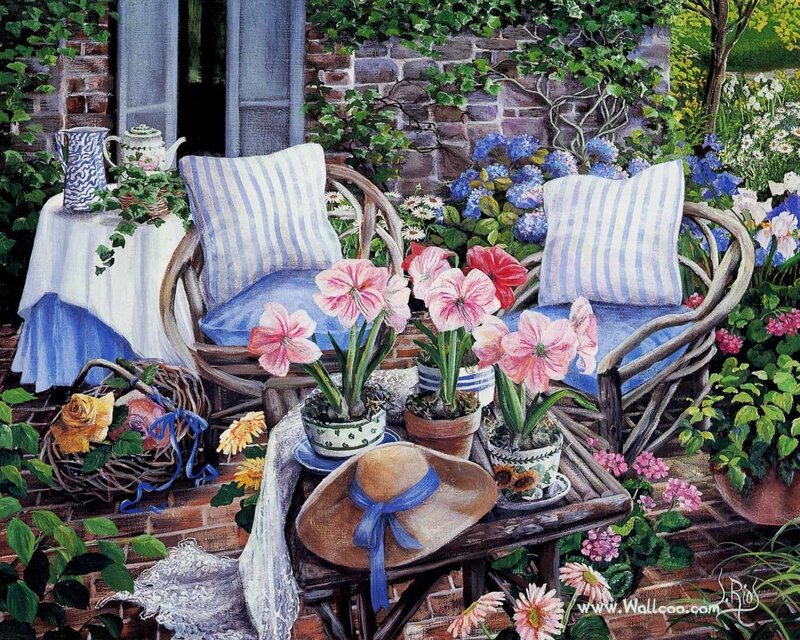 Garden patio with flowers and chairs