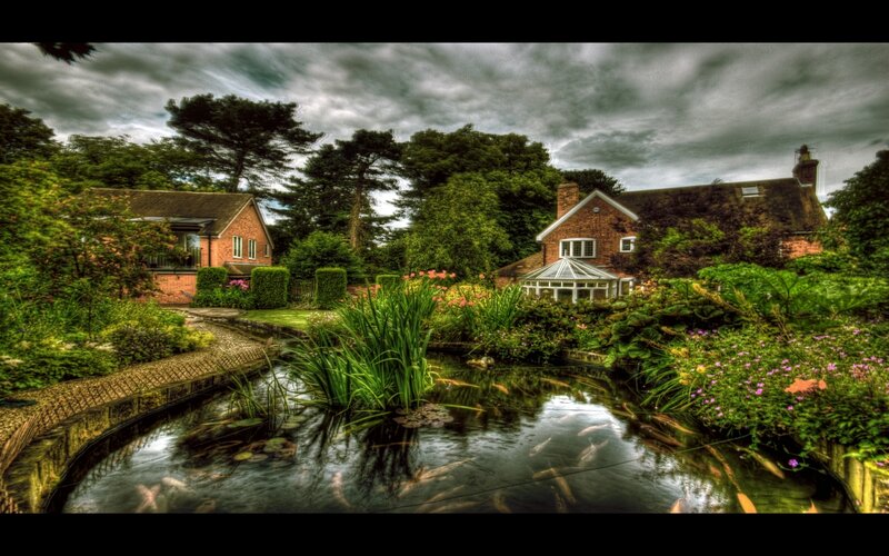 Garden pond with brick house