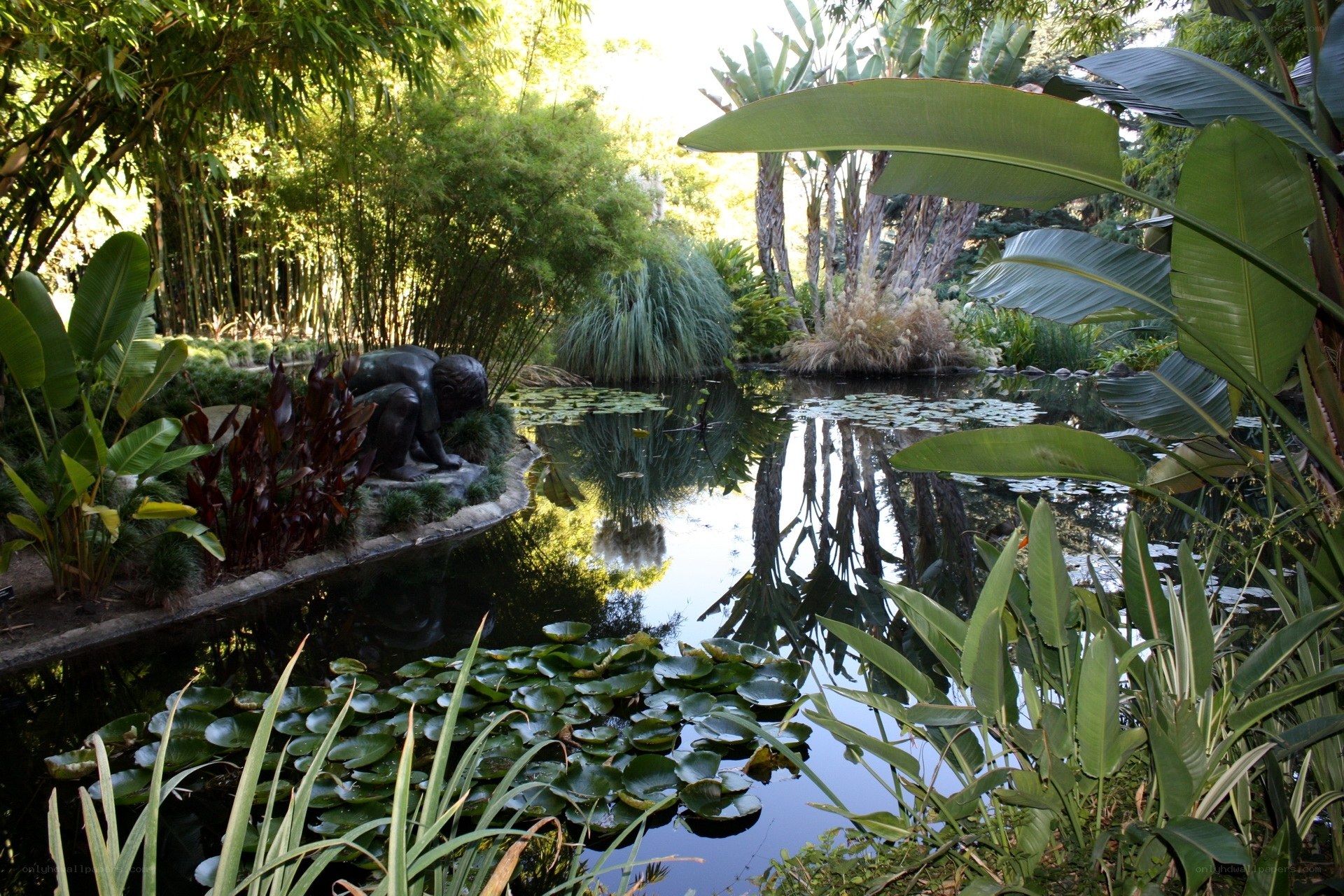 Garden pond with sculpture