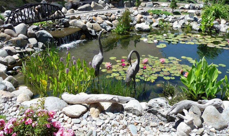 Garden pond with sculptures