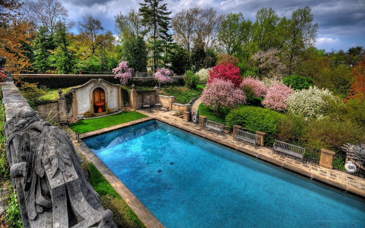 Garden pool with stone fountain