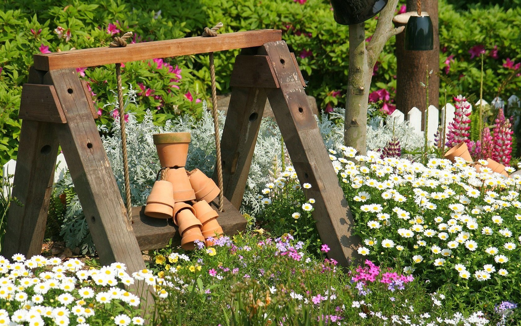 Garden swing with terracotta pots