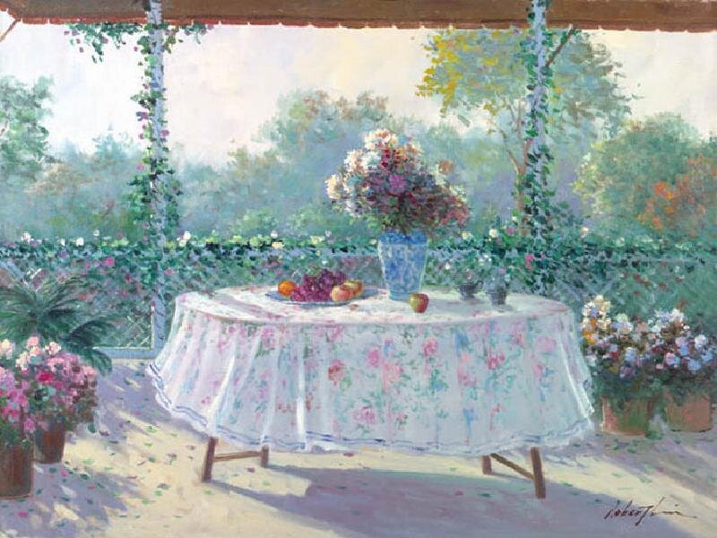 Garden table with flowers and fruit