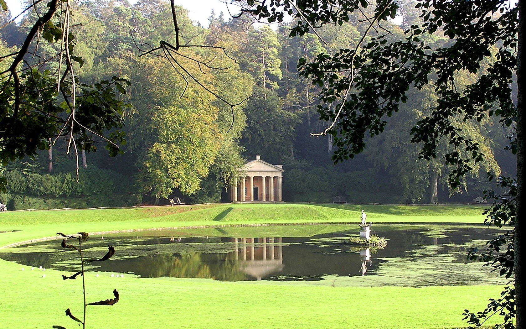 Garden temple by a pond