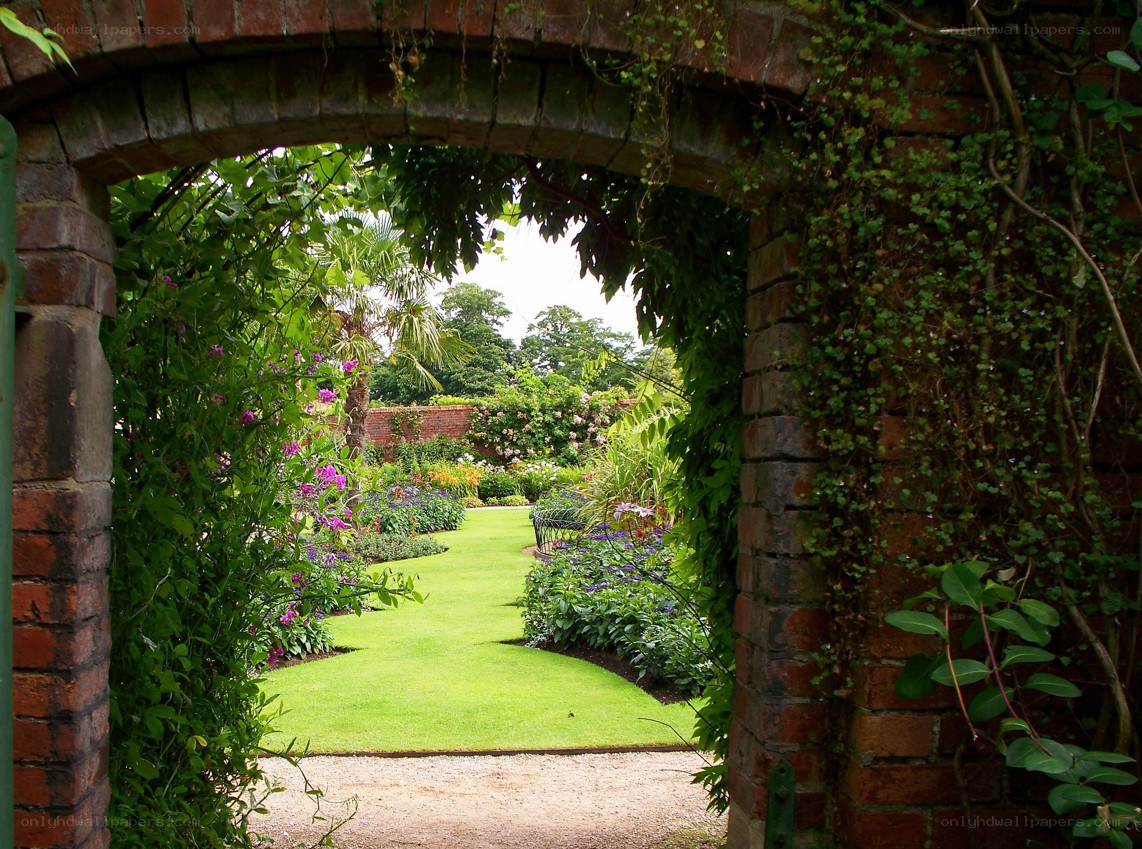 garden through brick archway