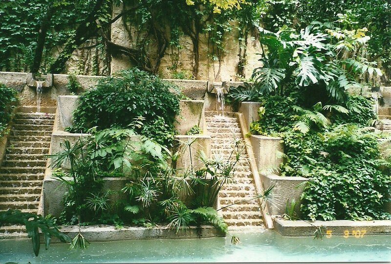 Garden waterfall with stone steps