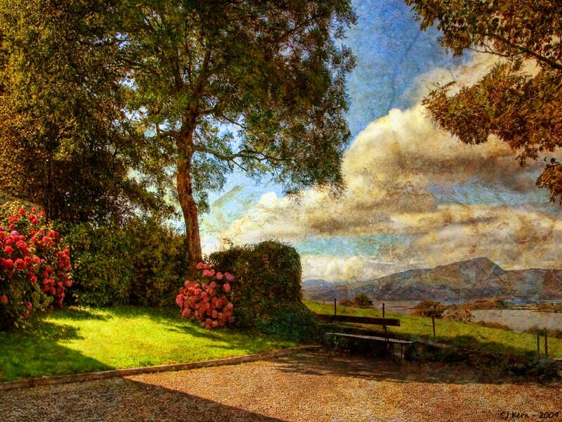 Garden with bench and mountains