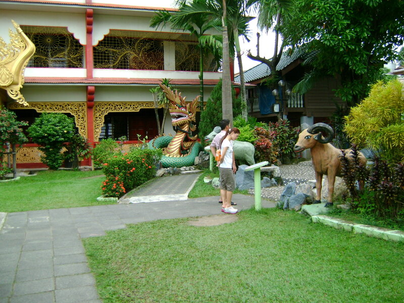 Garden with dragon and ram statues