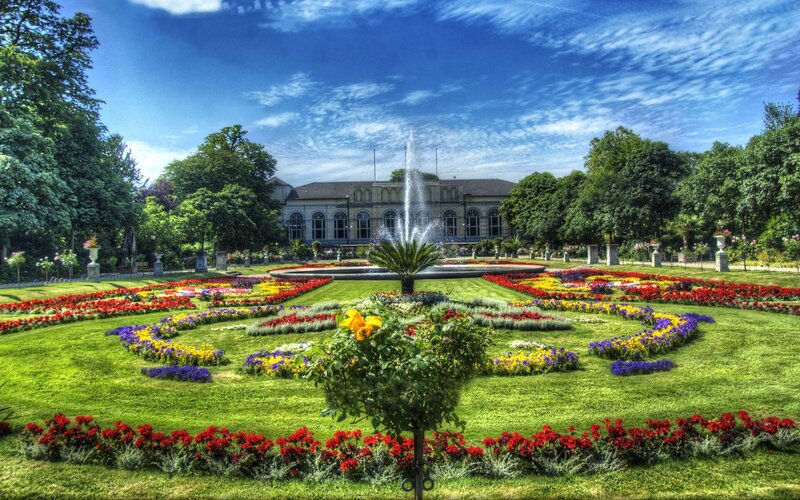 Garden with fountain and building