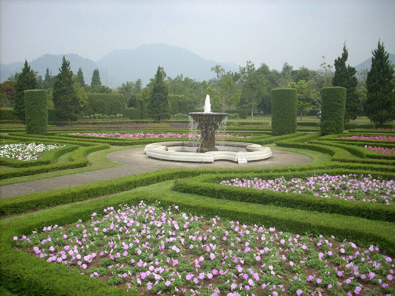 Garden with fountain and flowers