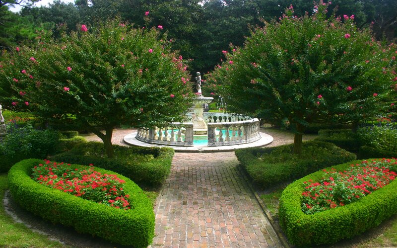 Garden with fountain and flowers