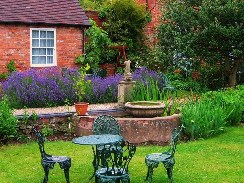 garden with fountain and table