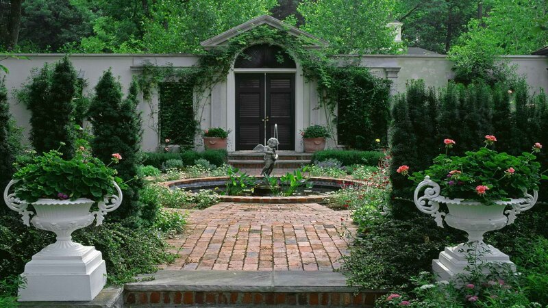 garden with fountain and urns