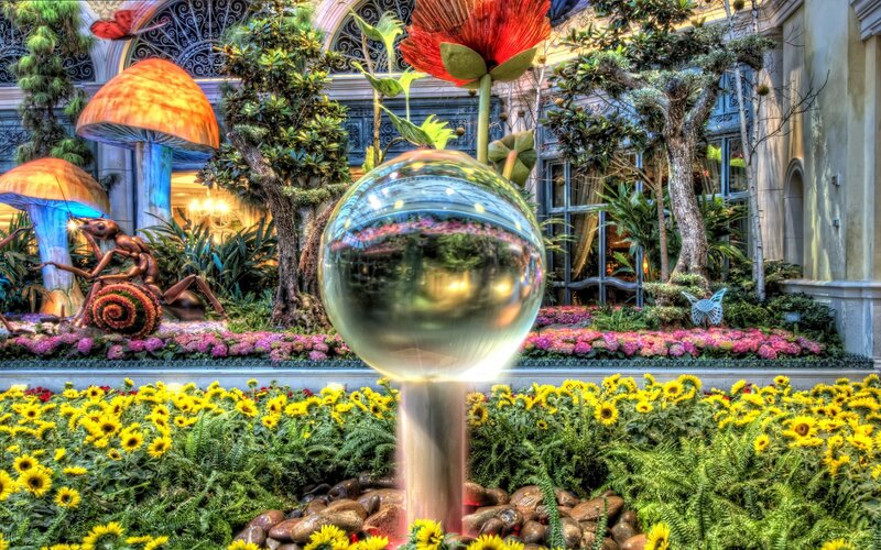 Garden with giant flowers and sculptures