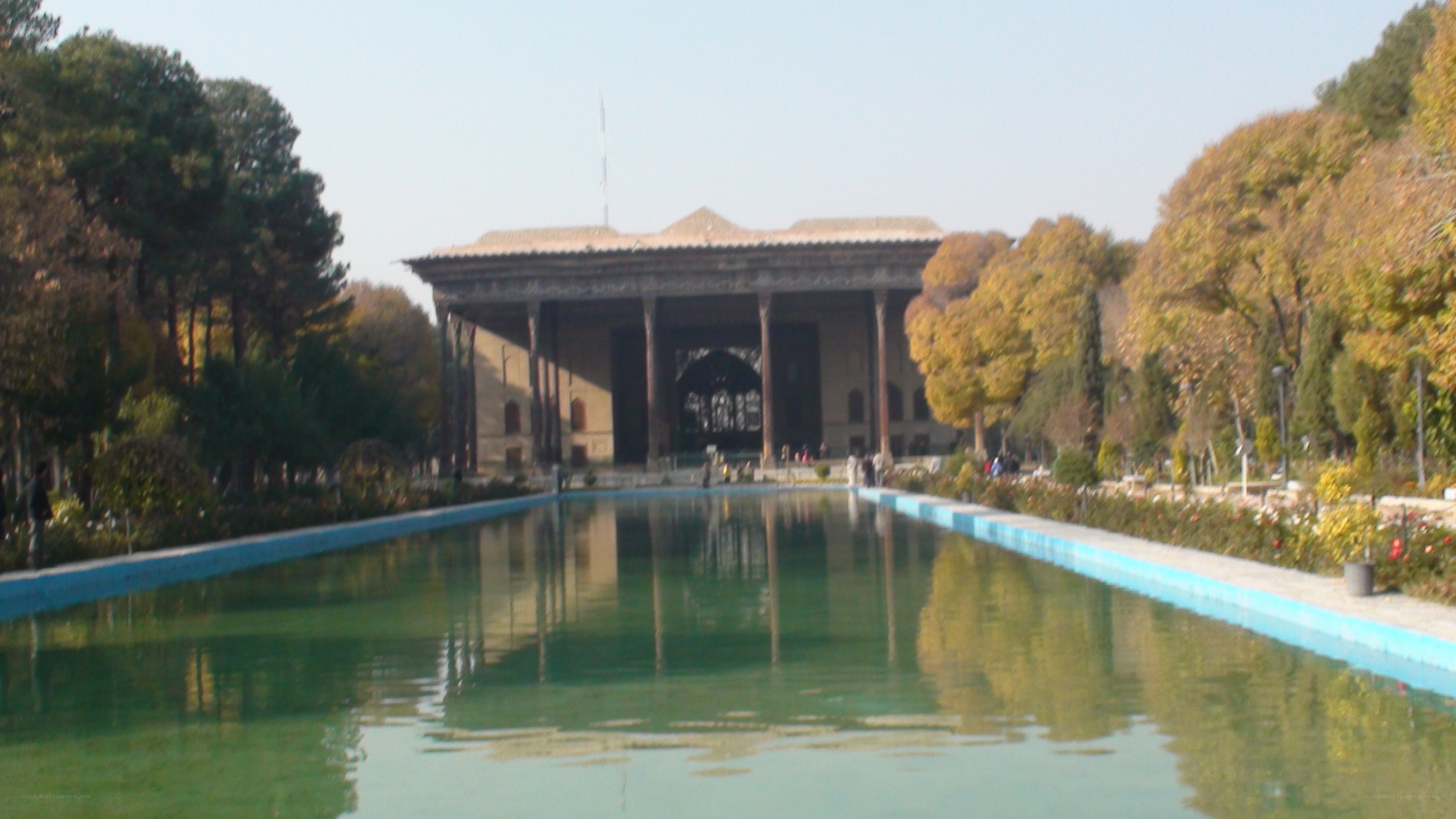 garden with long pool and pavilion