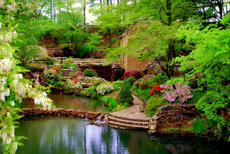 Garden with pond and stone bridge