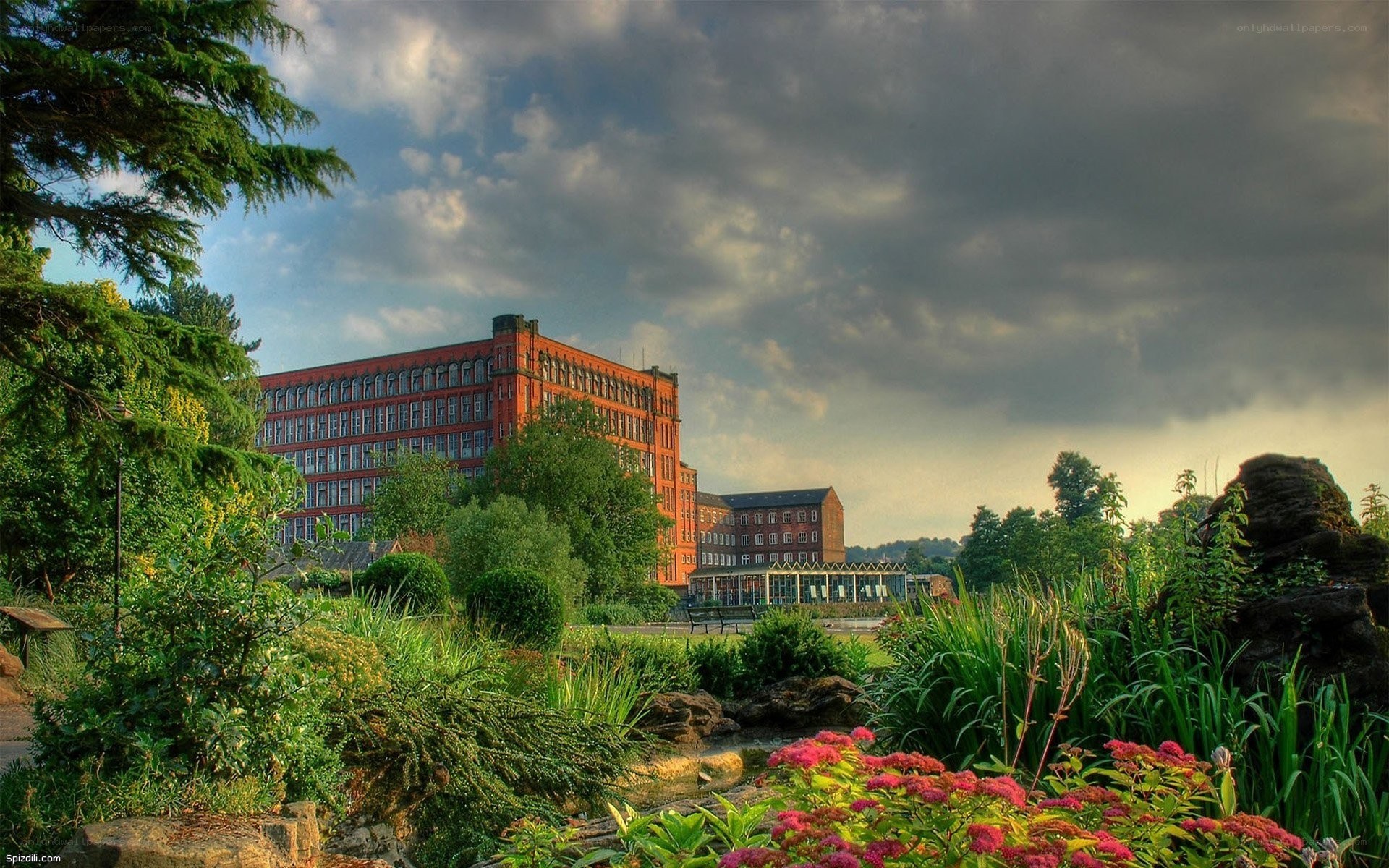Garden with red brick building