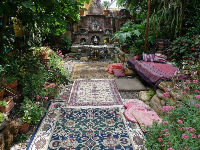 Garden with rugs and cushions