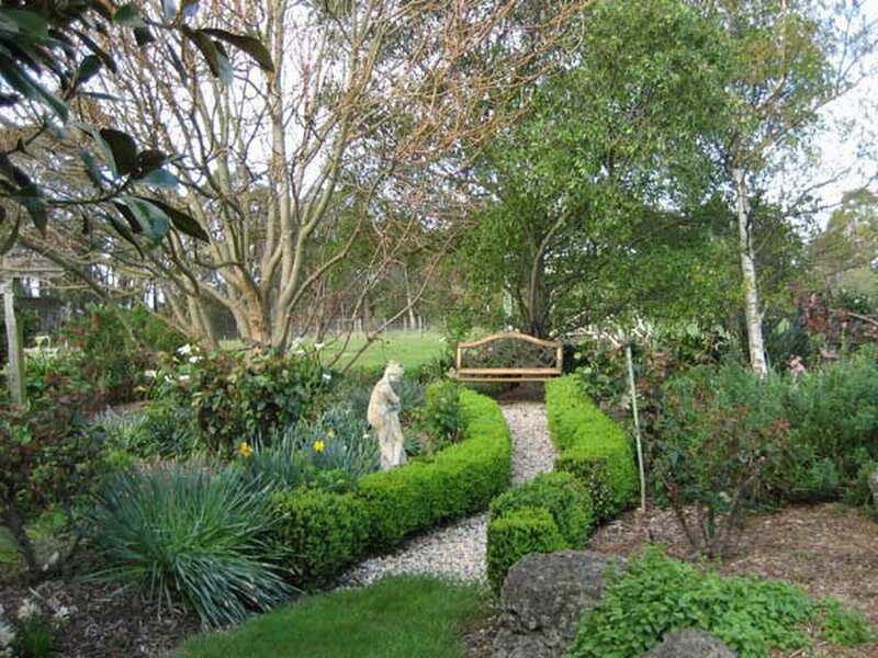 Garden with Statue and Bench