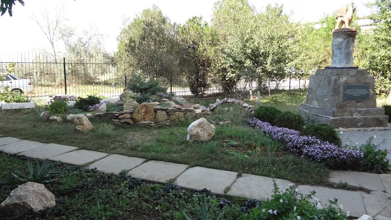 garden with statue and stone path