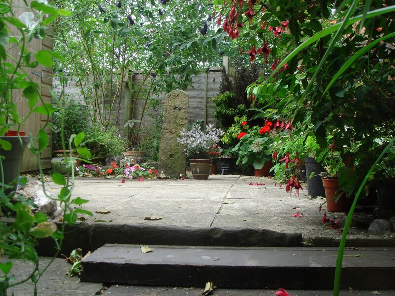 Garden with stone marker